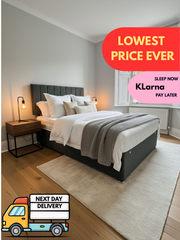 Modern bedroom with a bed and nightstands, featuring promotional text for lowest price, next day delivery, and Klarna payment option.