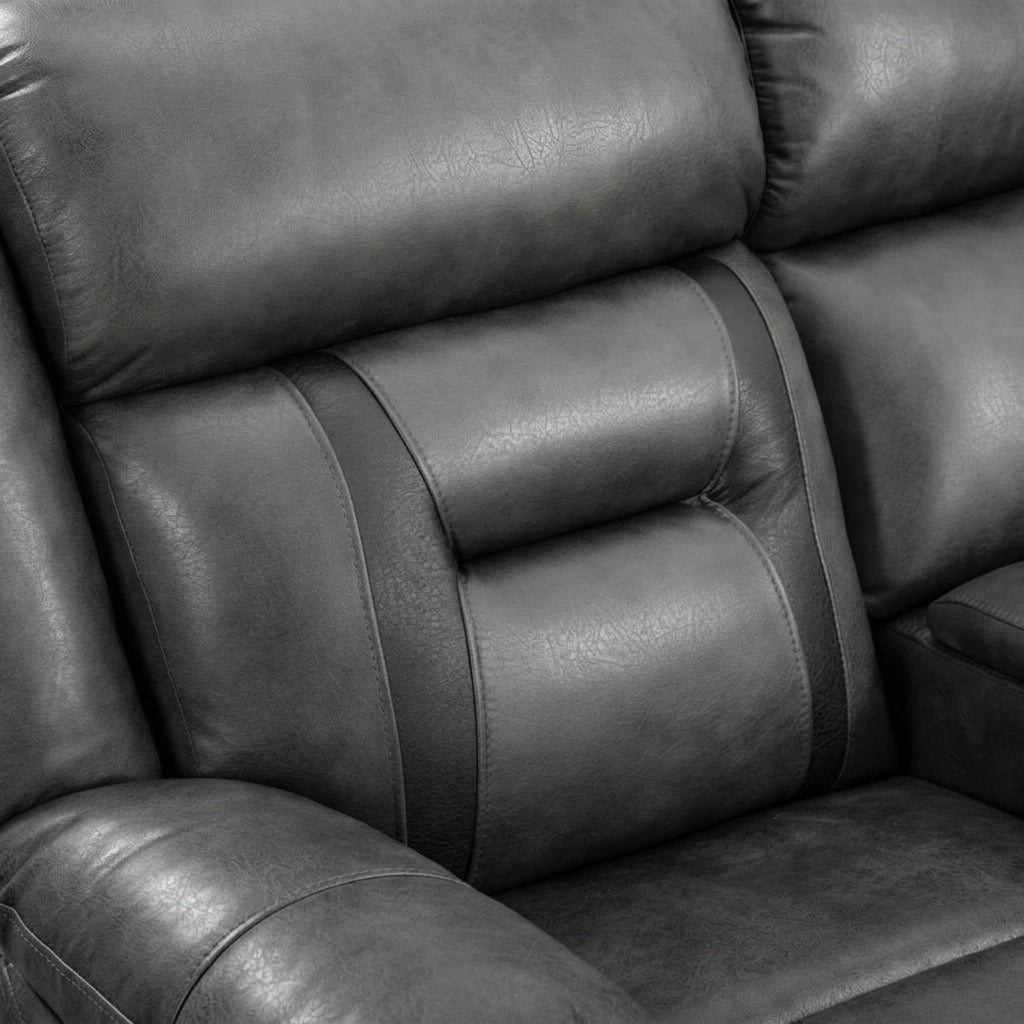 Black leather reclining corner sofa padded backrest and stitching detail