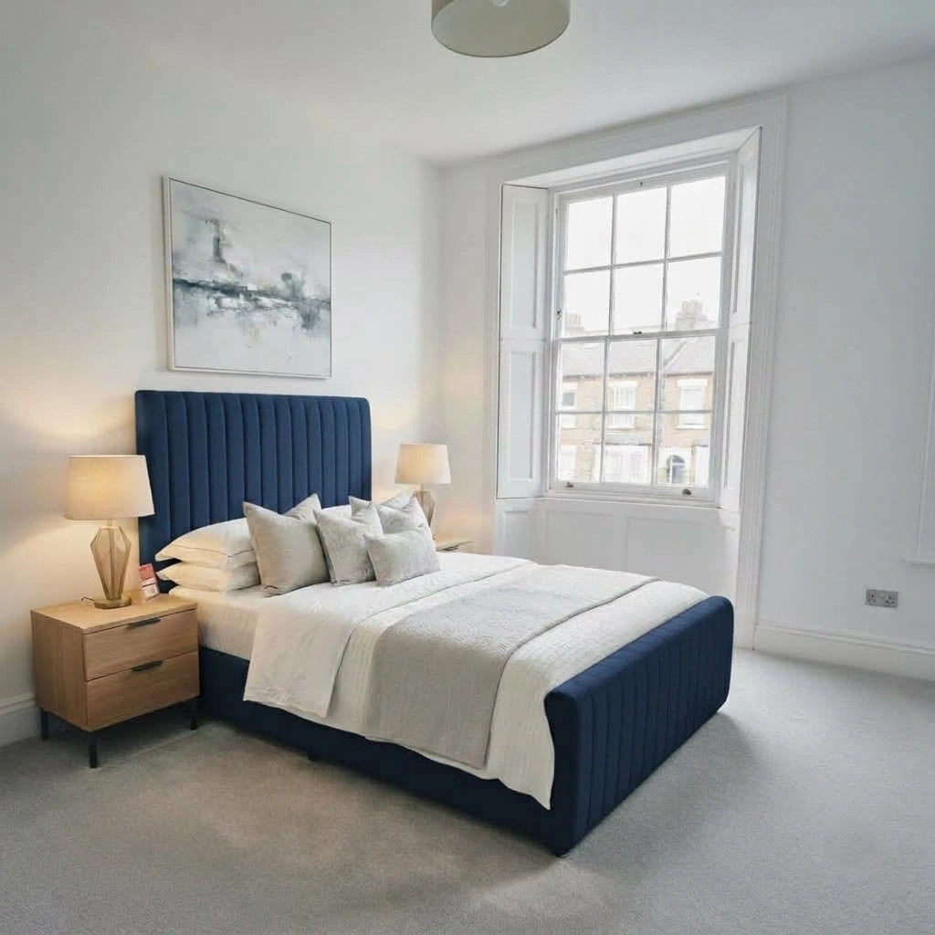 Blue extra padding bed frame with Roslin mattress and footboard