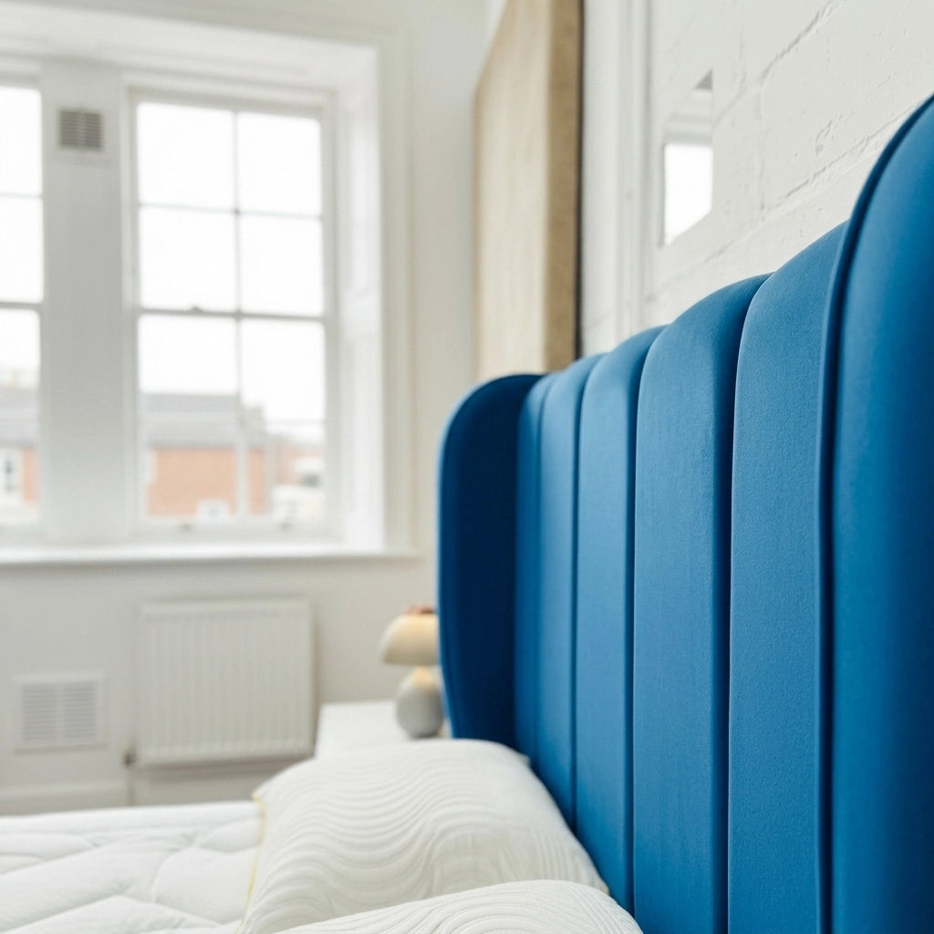 Close up of blue Valencia thick wing line headboard
